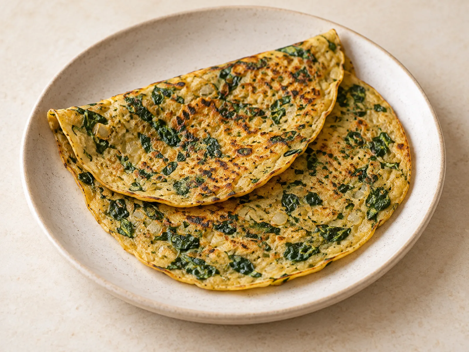 Spinach chickpea pancakes served ready to eat
